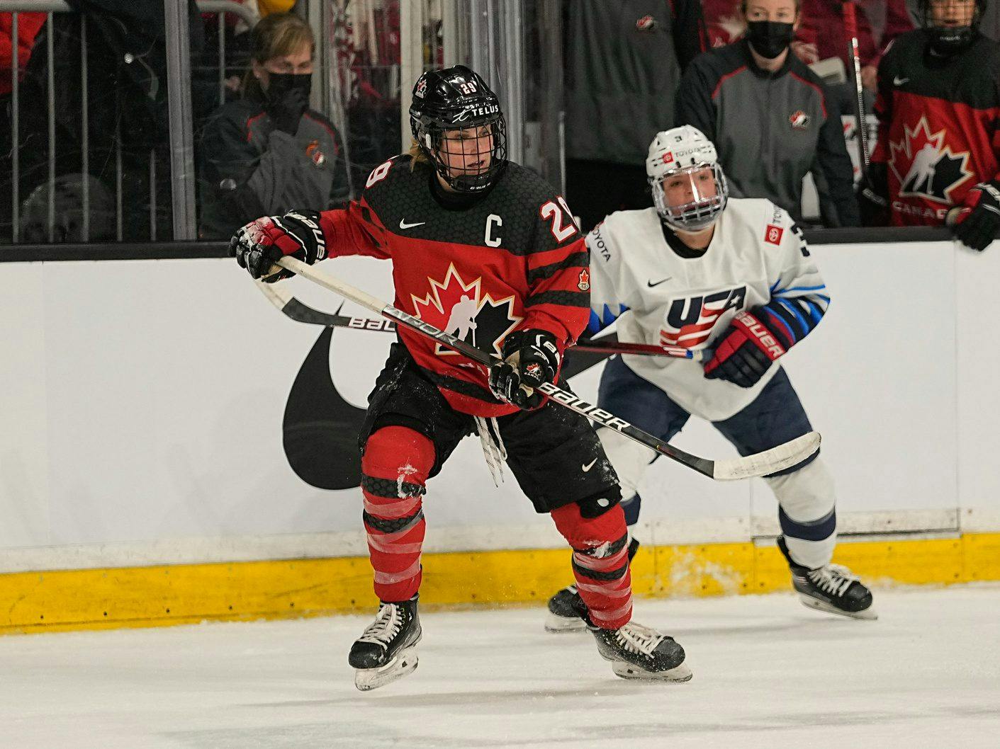 Natalie Spooner, with fellow Canadian women's Olympic hockey