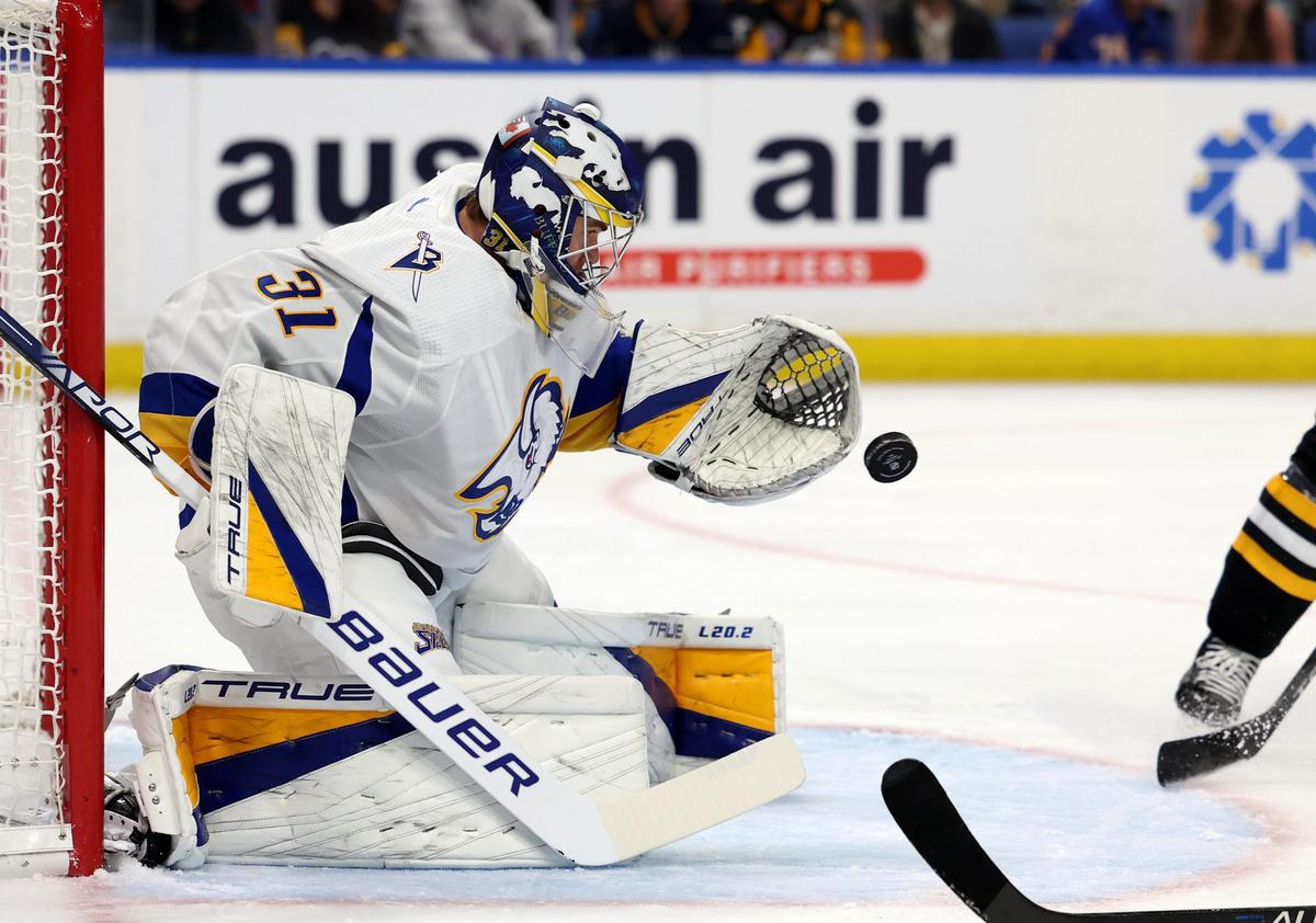 Injured goalie Eric Comrie rejoins Sabres on road trip, looks for