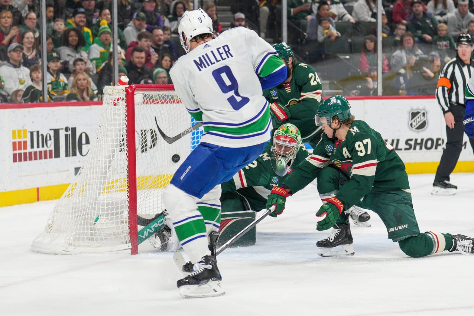 Wild, Canucks deliver NHL’s first three-hat-trick game since 1992