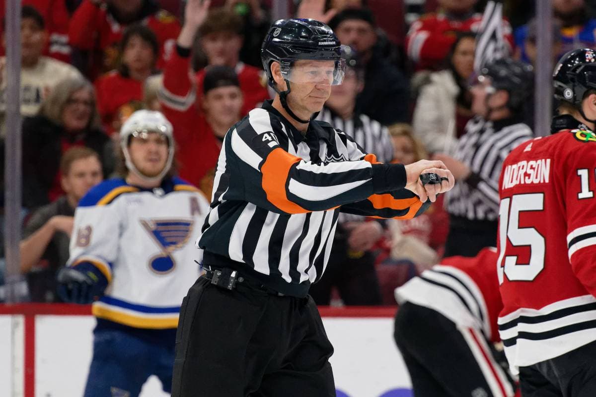 Referee Steve Kozari stretchered off the ice after collision with Lightning’s Haydn Fleury