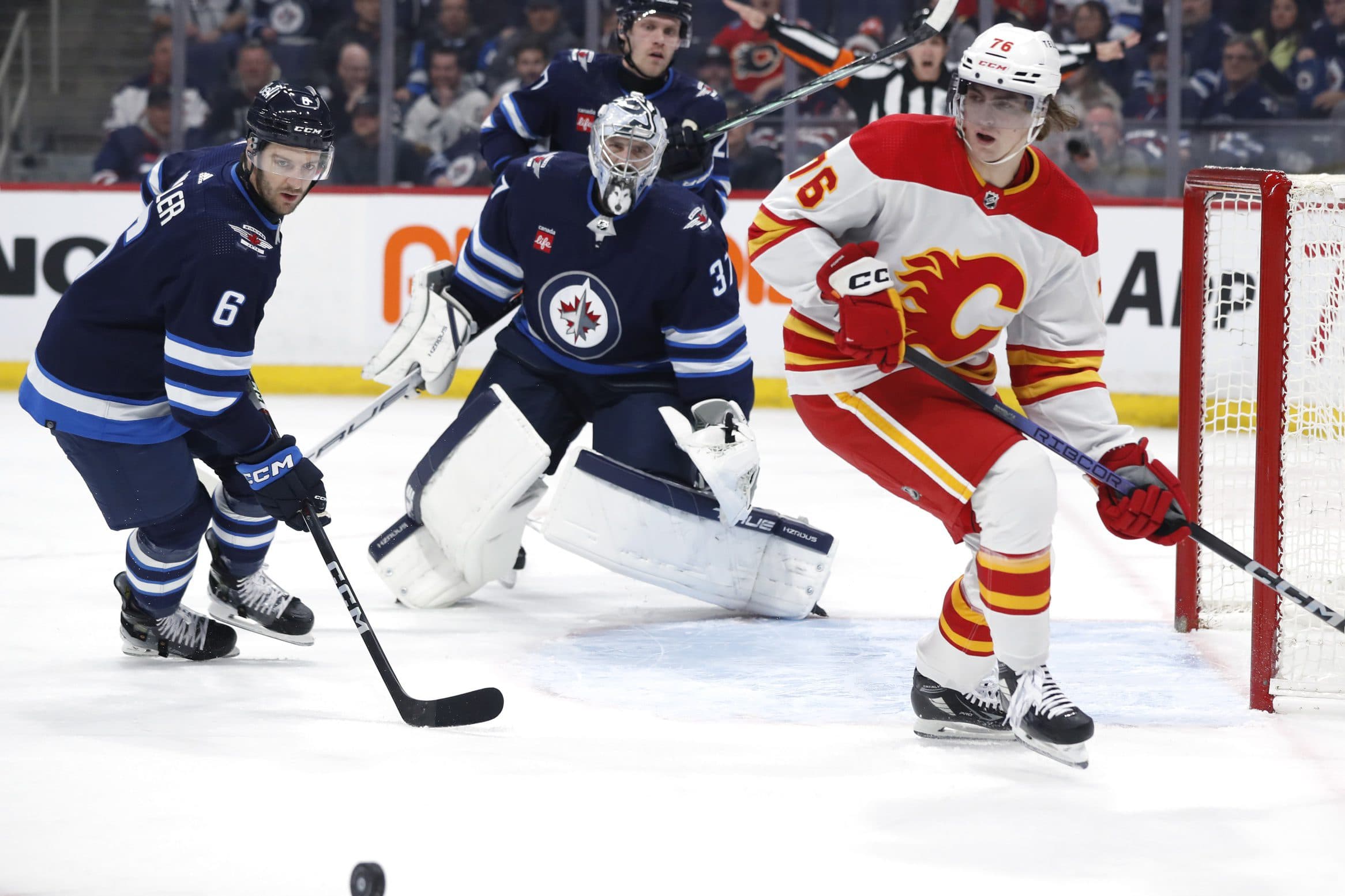 Calgary Flames’ Martin Pospisil ejected from game vs. Jets for elbowing