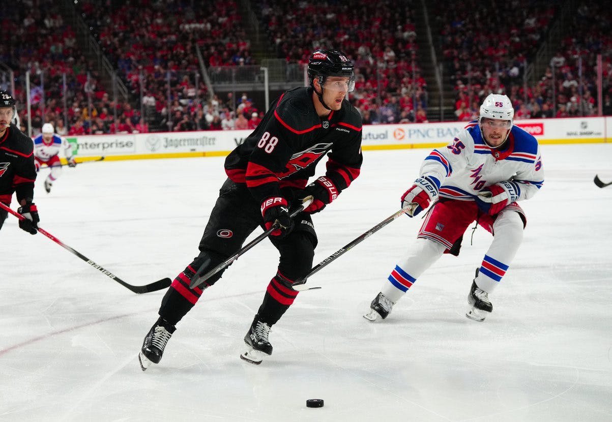 Carolina Hurricanes winger Martin Necas and New York Rangers defenseman Ryan Lindgren