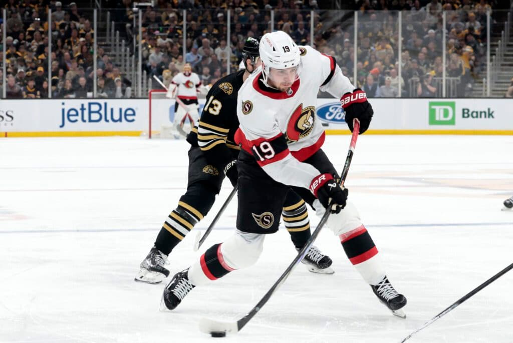 BOSTON, MA - APRIL 16: Ottawa Senators right wing Drake Batherson (19) drills a shot during a game between the Boston Bruins and the Ottawa Senators on April 16, 2024, at TD Garden in Boston, Massachusetts. (Photo by Fred Kfoury III/Icon Sportswire via Getty Images)