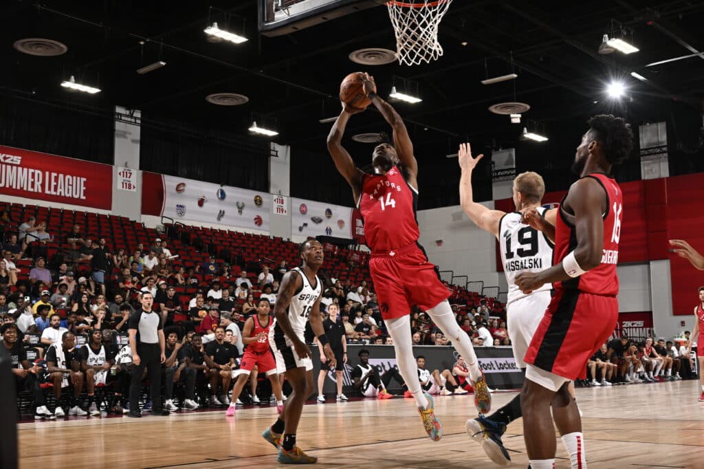 LAS VEGAS, NV - JULY 21: Ja'Kobe Walter #14 of the Toronto Raptors shoots the ball during the game against the San Antonio Spurs on July 21, 2024 at the Cox Pavilion in Las Vegas, Nevada. NOTE TO USER: User expressly acknowledges and agrees that, by downloading and or using this photograph, User is consenting to the terms and conditions of the Getty Images License Agreement. Mandatory Copyright Notice: Copyright 2024 NBAE (Photo by David Dow/NBAE via Getty Images)