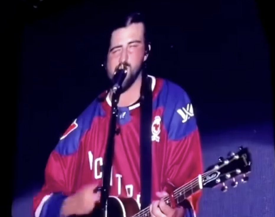 Noah Kahan wears PWHL Montreal jersey while performing at Osheaga 2024