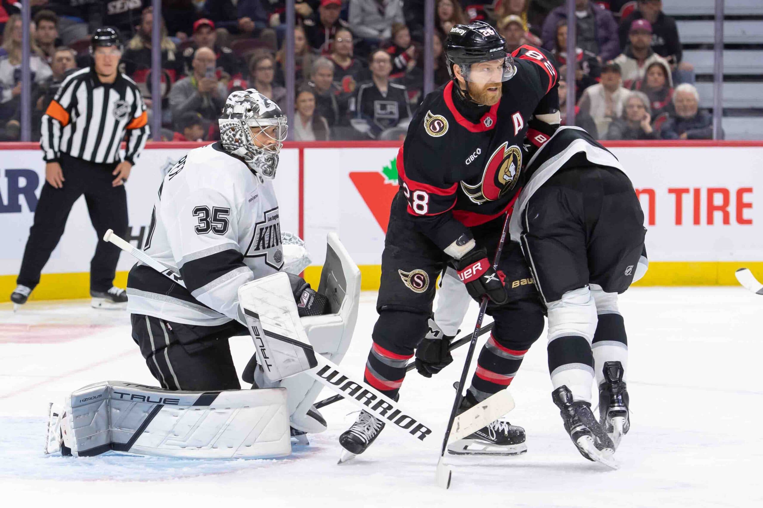 LA Kings goaltender Darcy Kuemper and Ottawa Senators forward Claude Giroux.