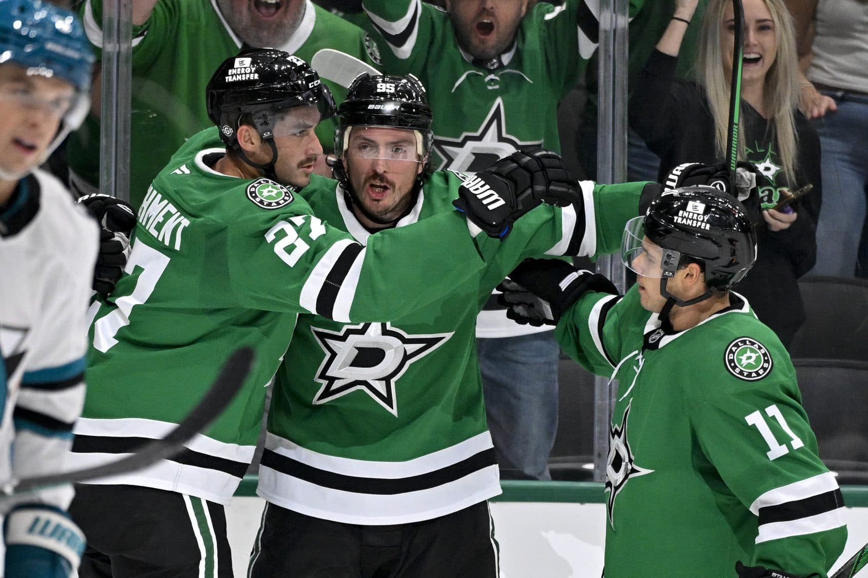 Dallas Stars left wing Mason Marchment (27) and center Matt Duchene (95) and center Logan Stankoven (11) celebrate during the game between the Dallas Stars and the San Jose Sharks at the American Airlines Center.