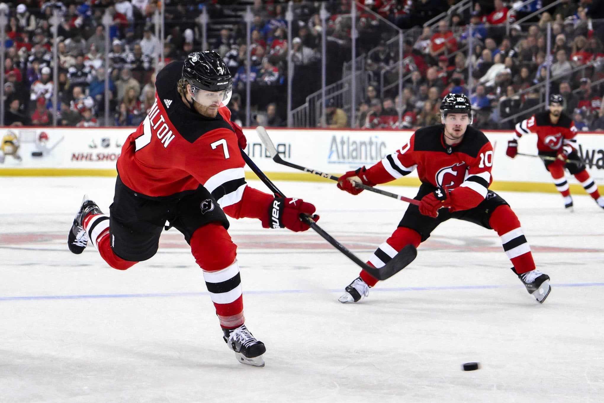 New Jersey Devils defenseman Dougie Hamilton (7) shoots the puck against the New York Rangers during the second period at Prudential Center.