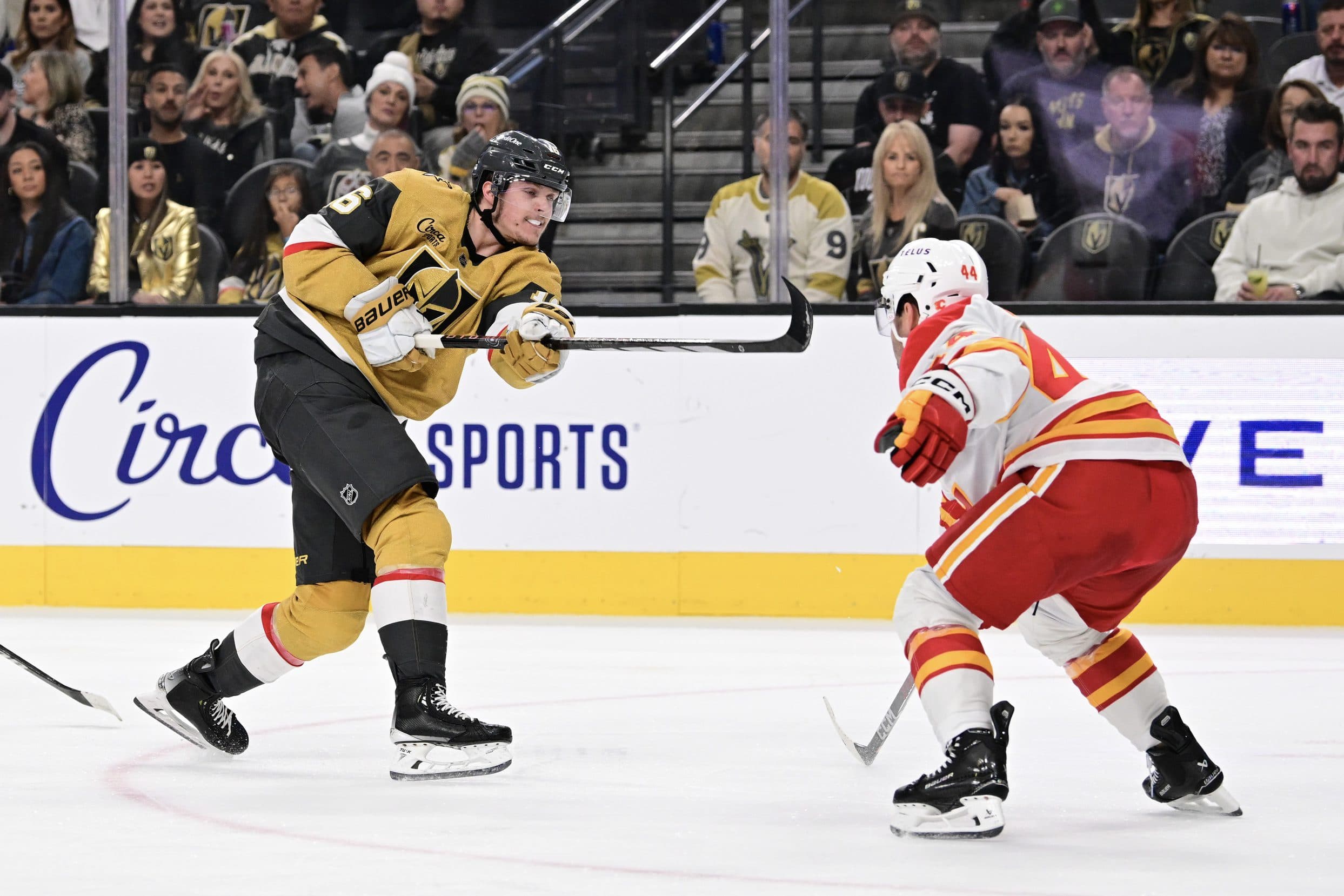 Vegas Golden Knights left wing Pavel Dorofeyev (16) shoots the puck past Calgary Flames defenseman Joel Hanley (44) in the second period at T-Mobile Arena