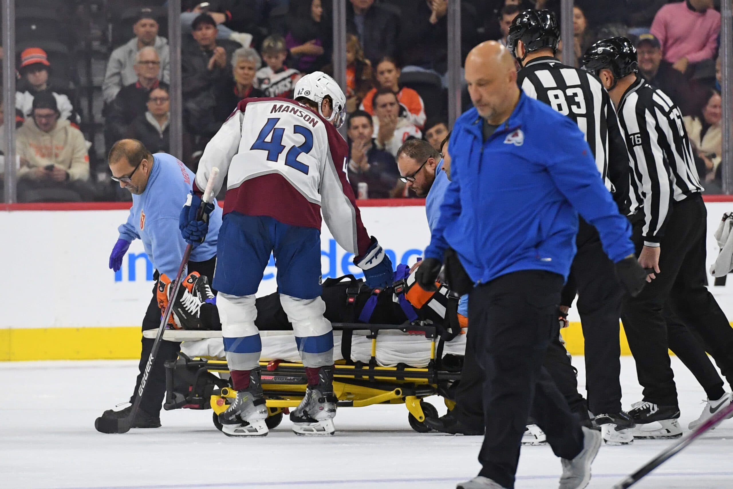 Referee Mitch Dunning taken to hospital following collision with Avalanche’s Josh Manson