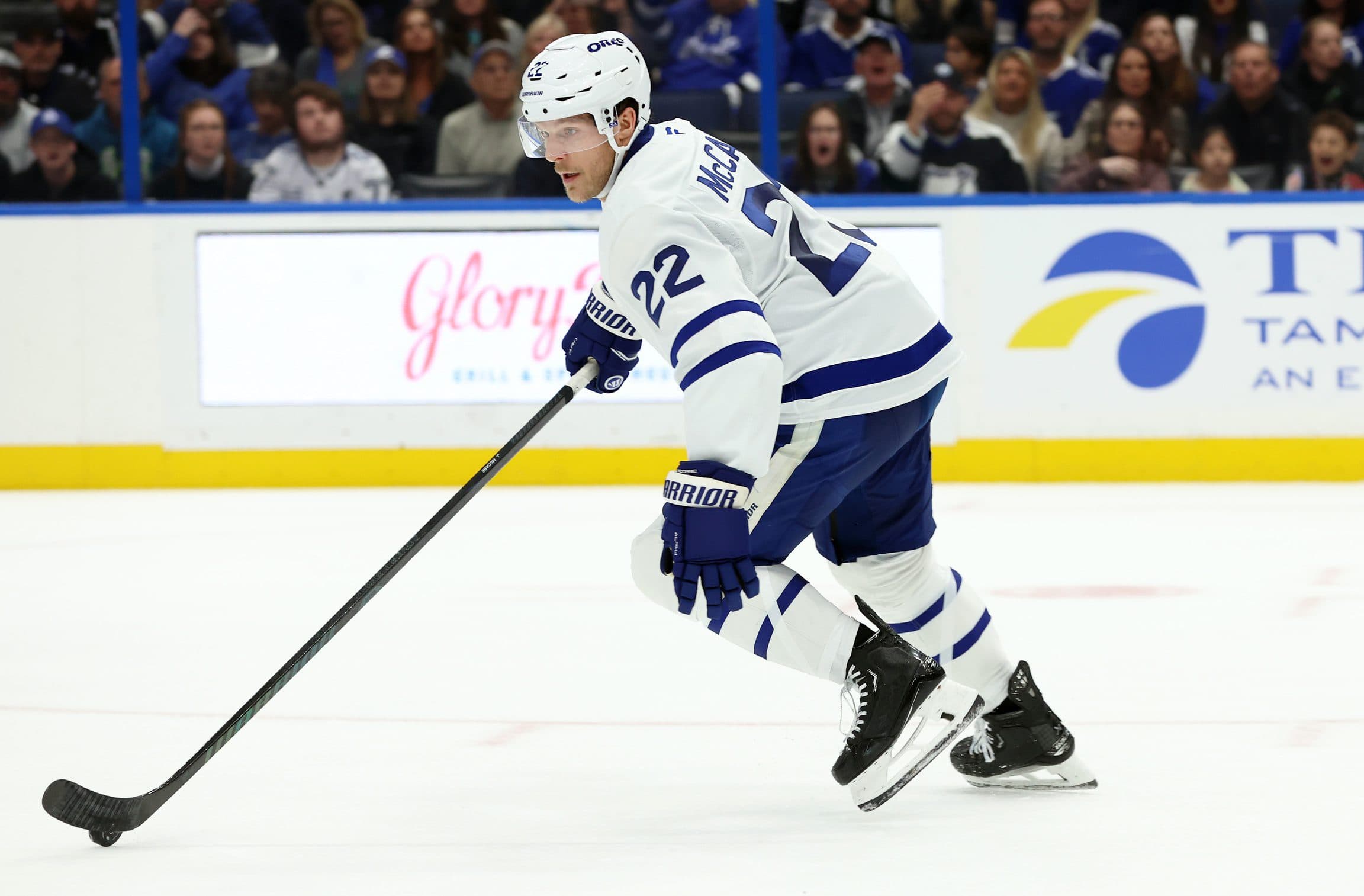 Toronto Maple Leafs defenseman Jake McCabe (22) skates with the puck against the Tampa Bay Lightning during the first period at Amalie Arena.