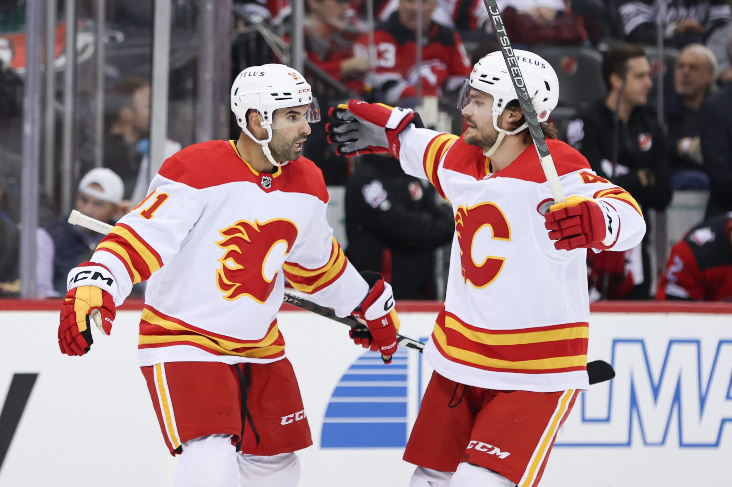 Nazem Kadri and Rasmus Andersson of the Calgary Flames.