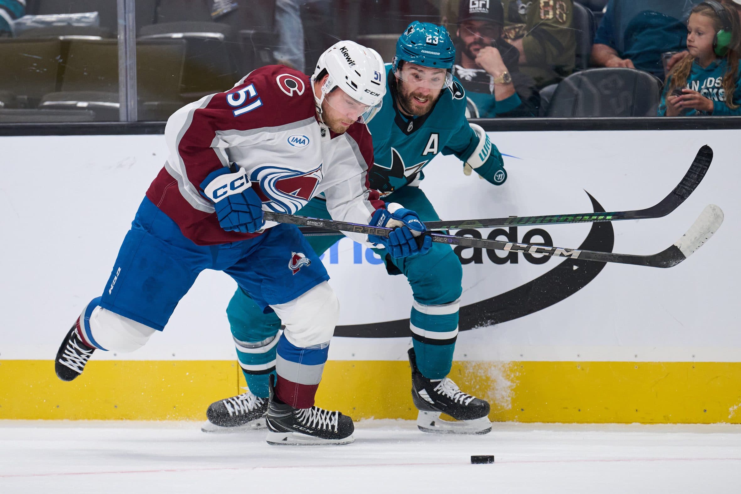 Colorado Avalanche right wing Nikolai Kovalenko (51) vies for the puck against San Jose Sharks center Ty Dellandrea (53) during the first period at SAP Center at San Jose.