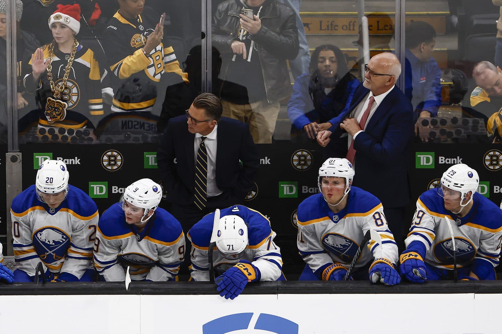 Buffalo Sabres head coach Lindy Ruff, right, looks on with his team during the final moments of their 3-1 loss to the Boston Bruins at TD Garden.