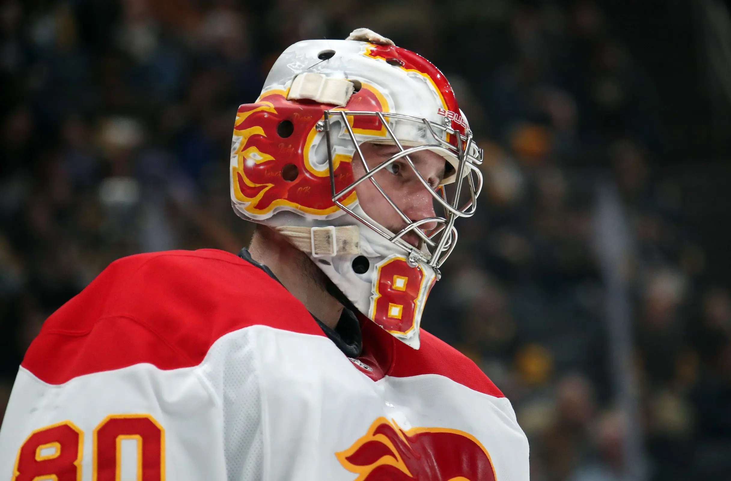 Calgary Flames goaltender Dan Vladar (80) looks on against the Pittsburgh Penguins during the first period at PPG Paints Arena.