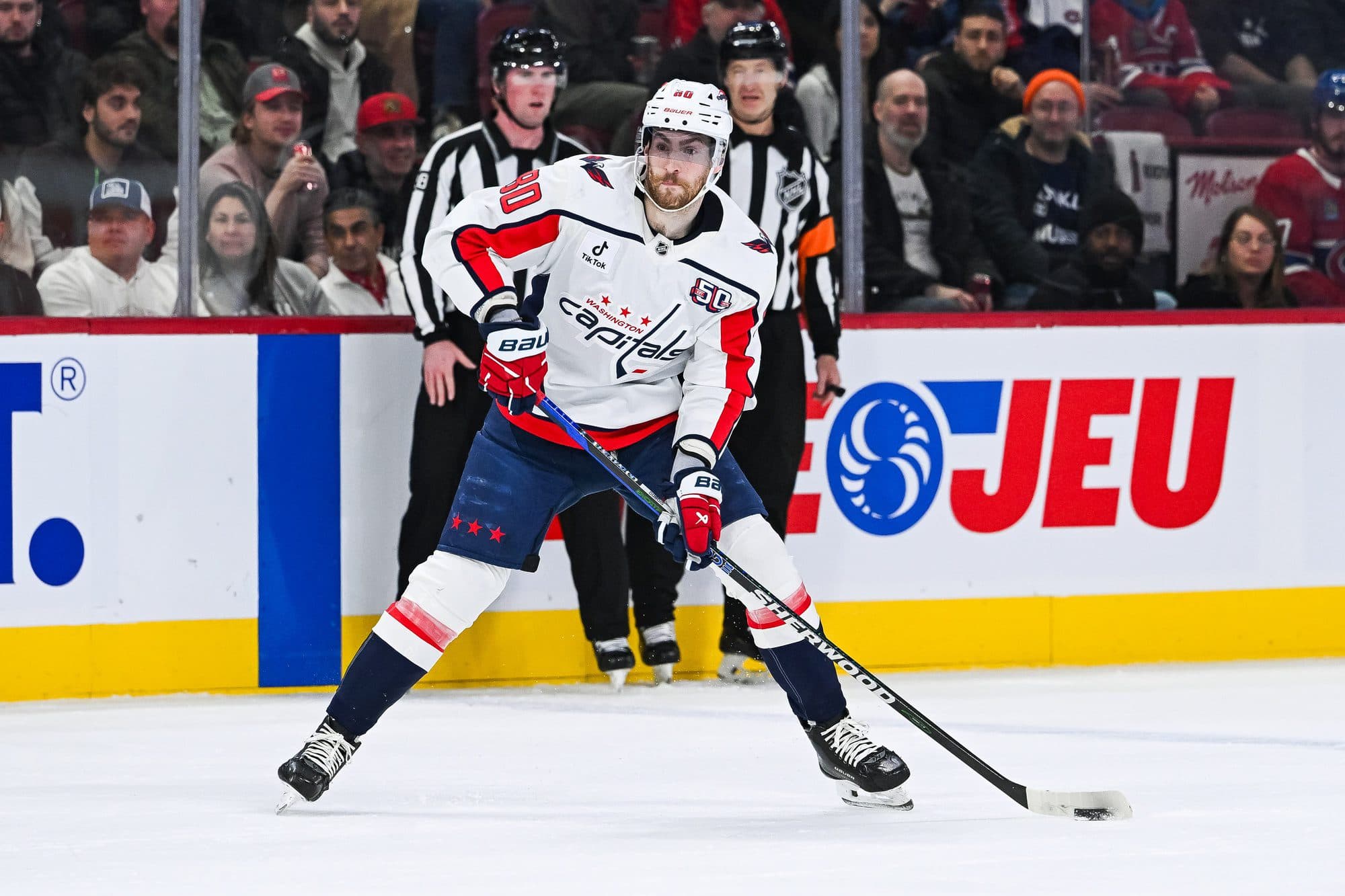 Washington Capitals left wing Pierre-Luc Dubois (80) plays the puck against the Montreal Canadiens during the first period at Bell Centre.