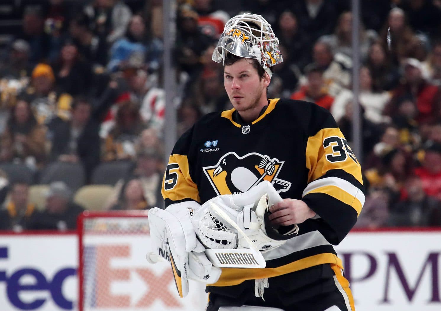 Pittsburgh Penguins goaltender Tristan Jarry (35) returns to his net against the Philadelphia Flyers during the second period at PPG Paints Arena.