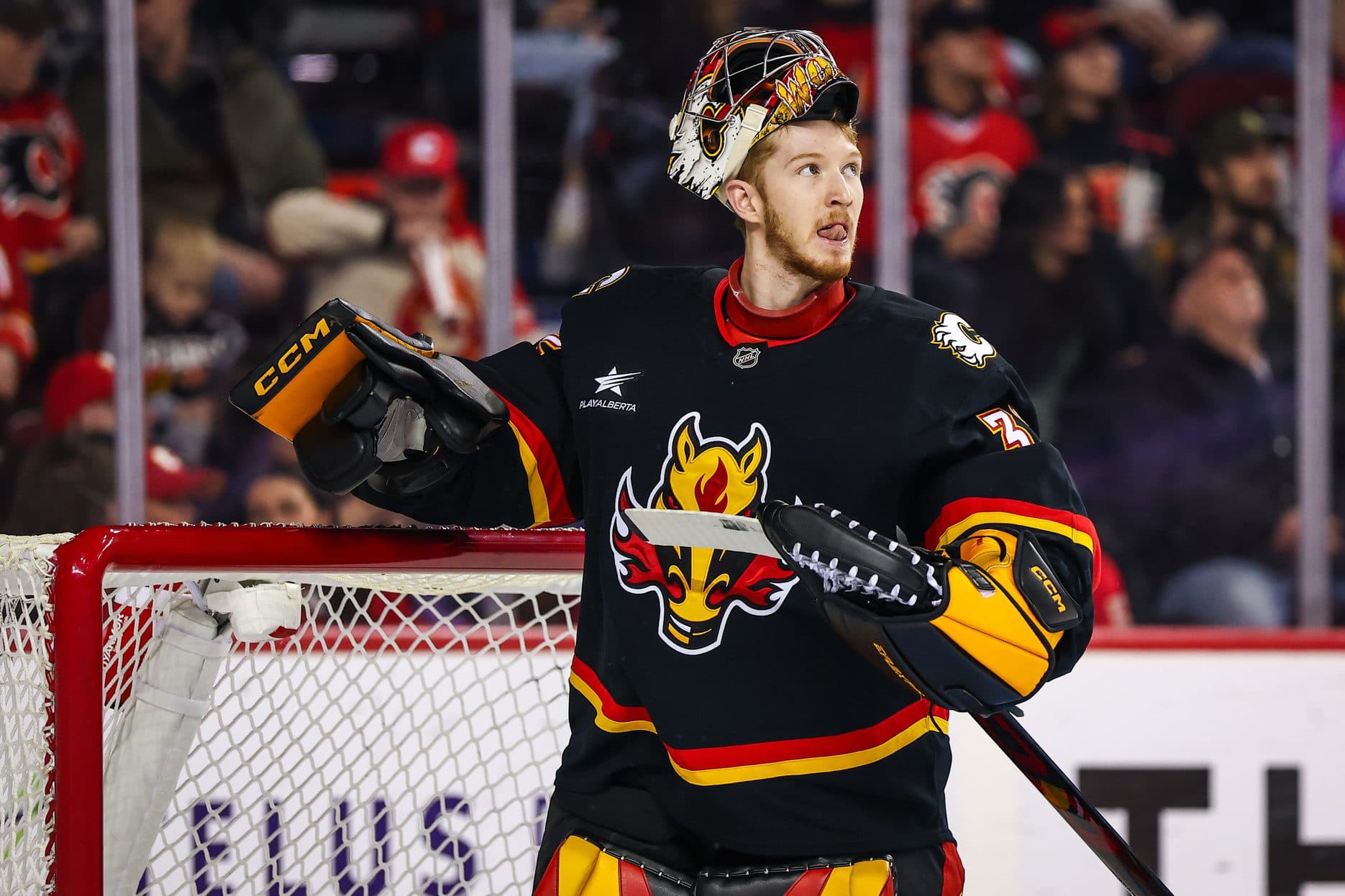 Calgary Flames goaltender Dustin Wolf (32) during the first period against the Nashville Predators at Scotiabank Saddledome.