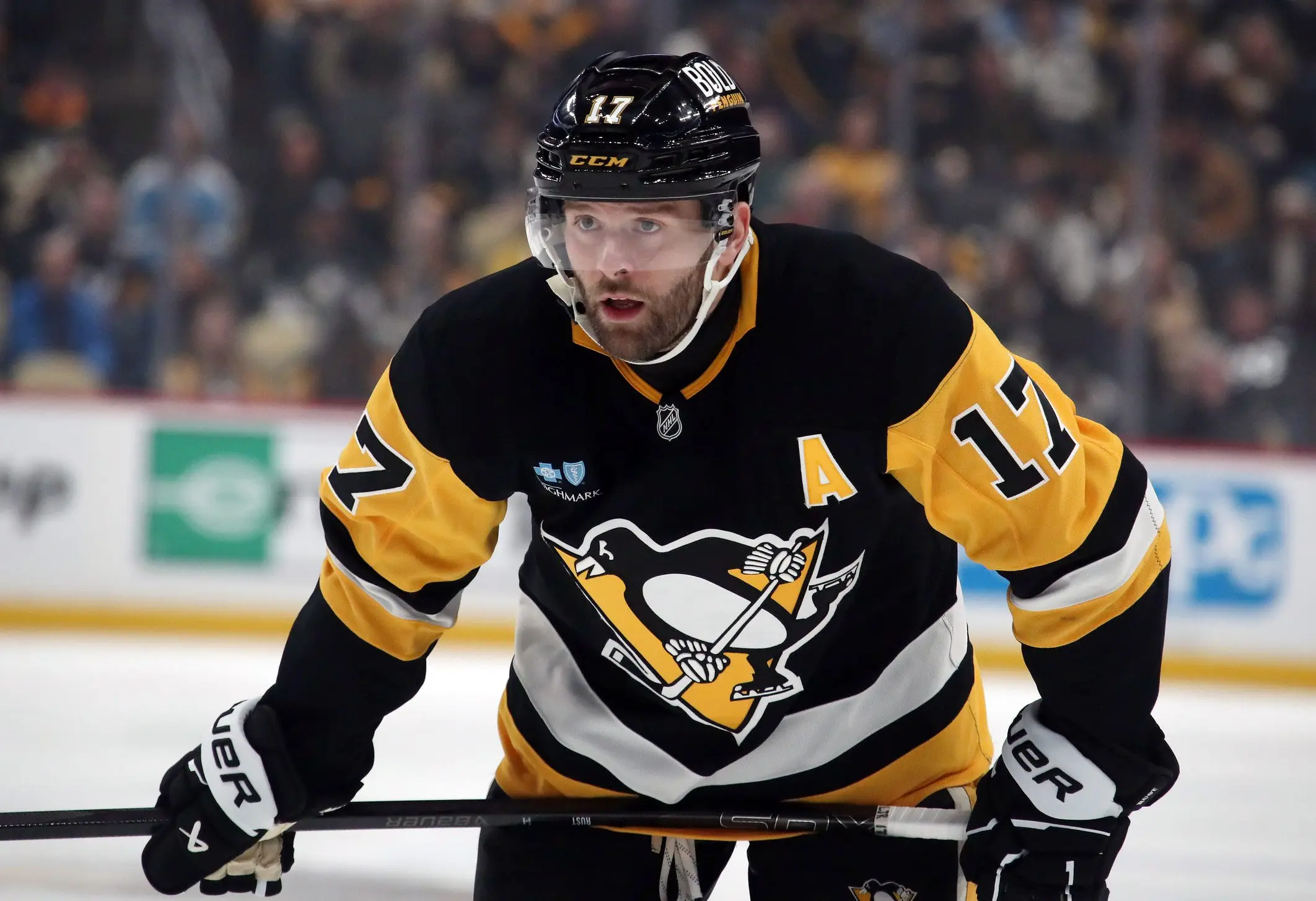 Pittsburgh Penguins right wing Bryan Rust (17) looks on at the face-off circle against the Ottawa Senators during the first period at PPG Paints Arena.