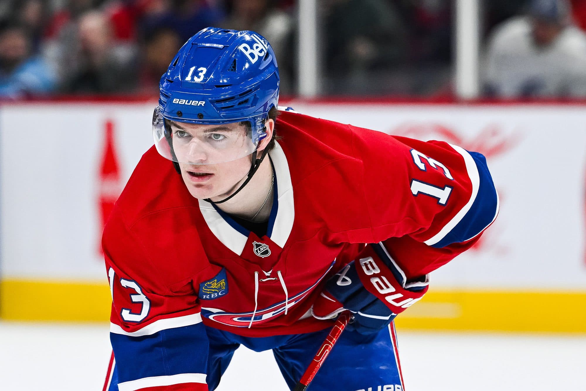 Montreal Canadiens right wing Cole Caufield (13) waits for a face-off against the Tampa Bay Lightning during the first period at Bell Centre.