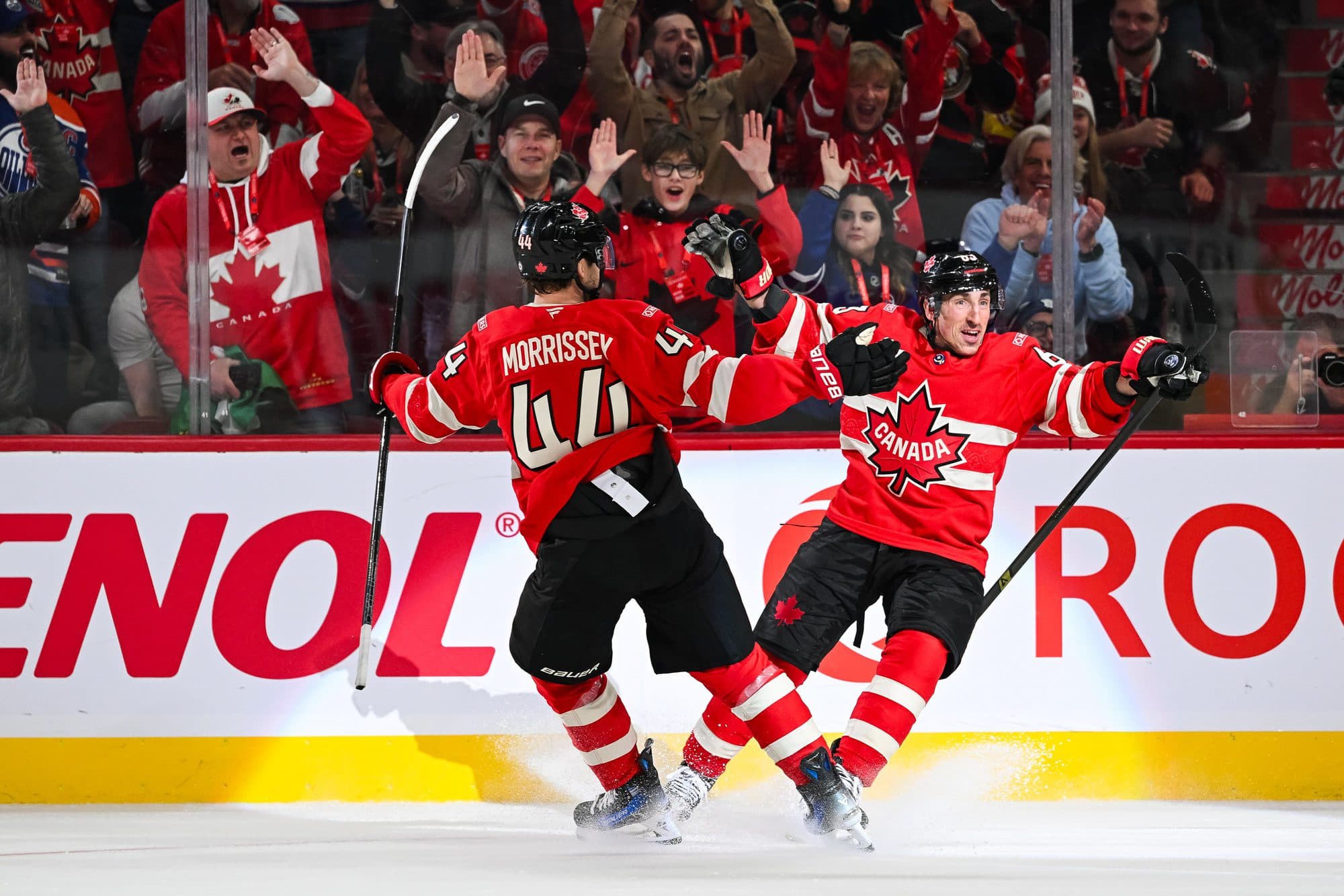 Team Canada forward Brad Marchand (63) celebrates with defenseman Josh Morrissey (44) his goal against Team Sweden in the first period during a 4 Nations Face-Off ice hockey game at Bell Centre.