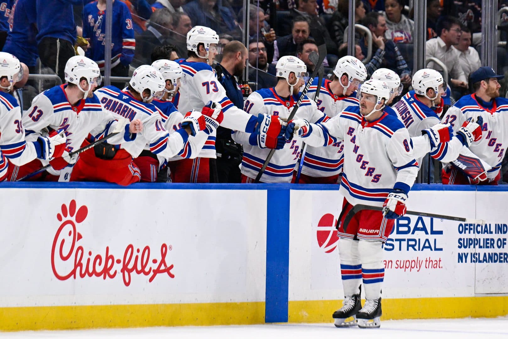 New York Rangers left wing J.T. Miller (8) celebrates his goal against the New York Islanders during the second period at UBS Arena.