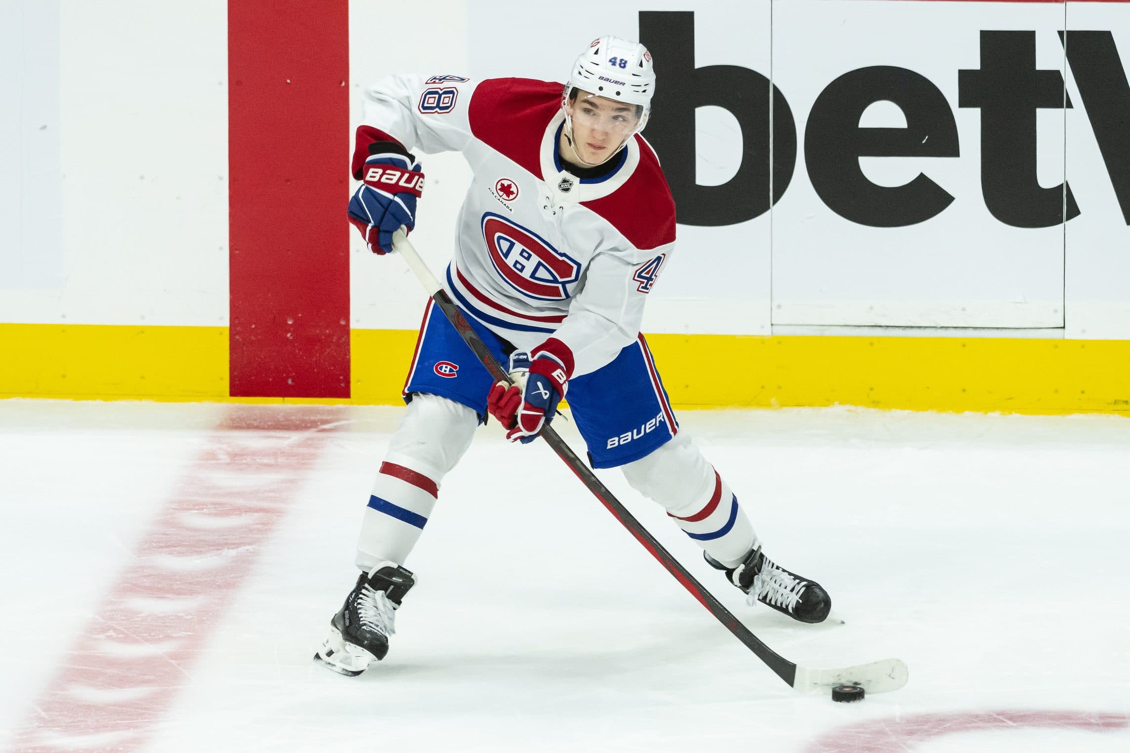 Montreal Canadiens defenseman Lane Hutson (48) shoots the puck in the third period against the Ottawa Senators at the Canadian Tire Centre.