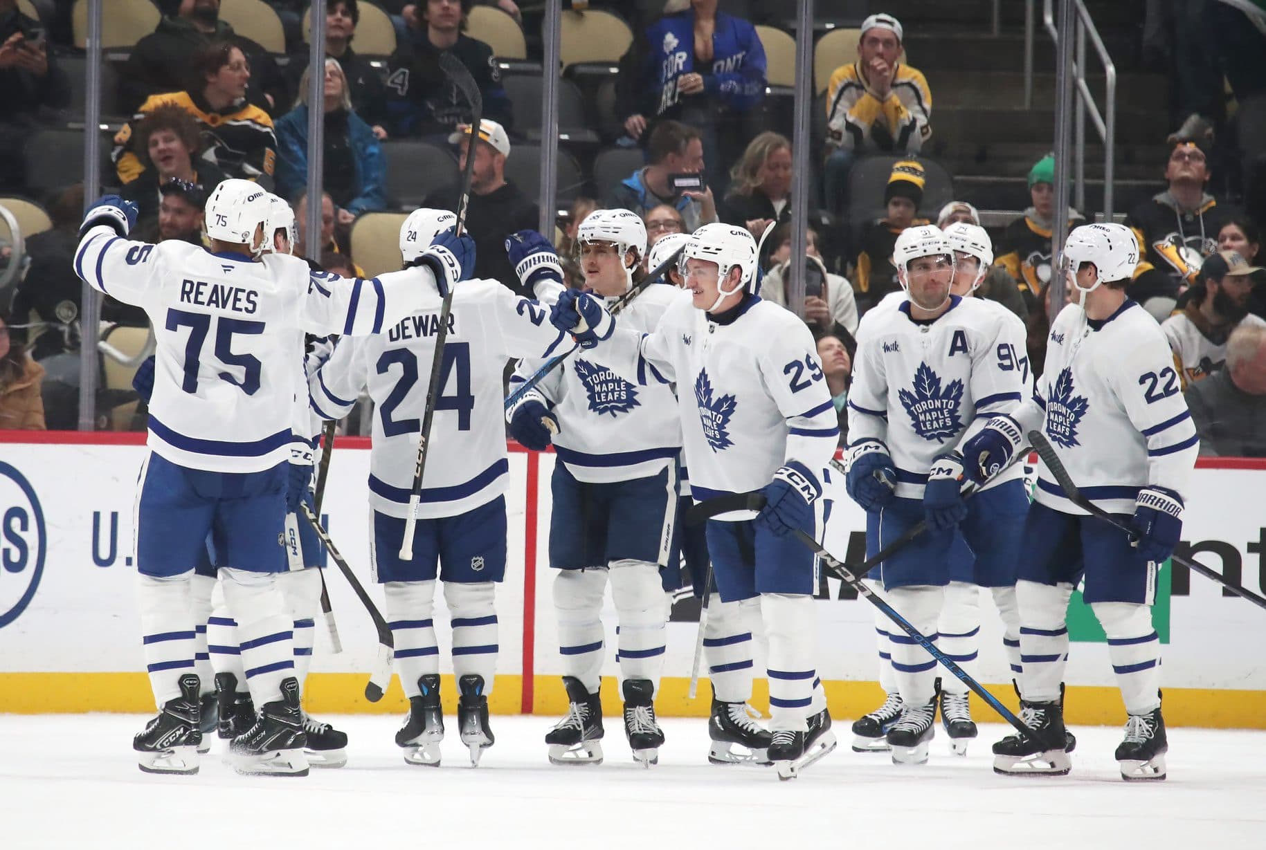 The Toronto Maple Leafs celebrate after defeating the Pittsburgh Penguins in overtime at PPG Paints Arena.