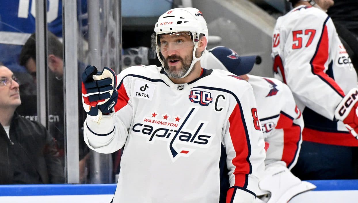 Washington Capitals forward Alex Ovechkin (8) gestures toward goalie Logan Thompson (not shown) as he celebrates scoring a goal against the Toronto Maple Leafs in the third period at Scotiabank Arena.