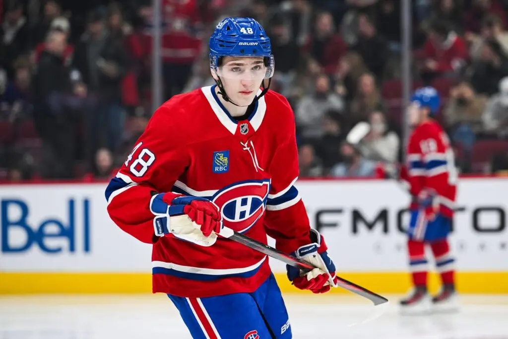 Feb 25, 2025; Montreal, Quebec, CAN; Montreal Canadiens defenseman Lane Hutson (48) looks on against the Carolina Hurricanesin the second period at Bell Centre. Mandatory Credit: David Kirouac-Imagn Images