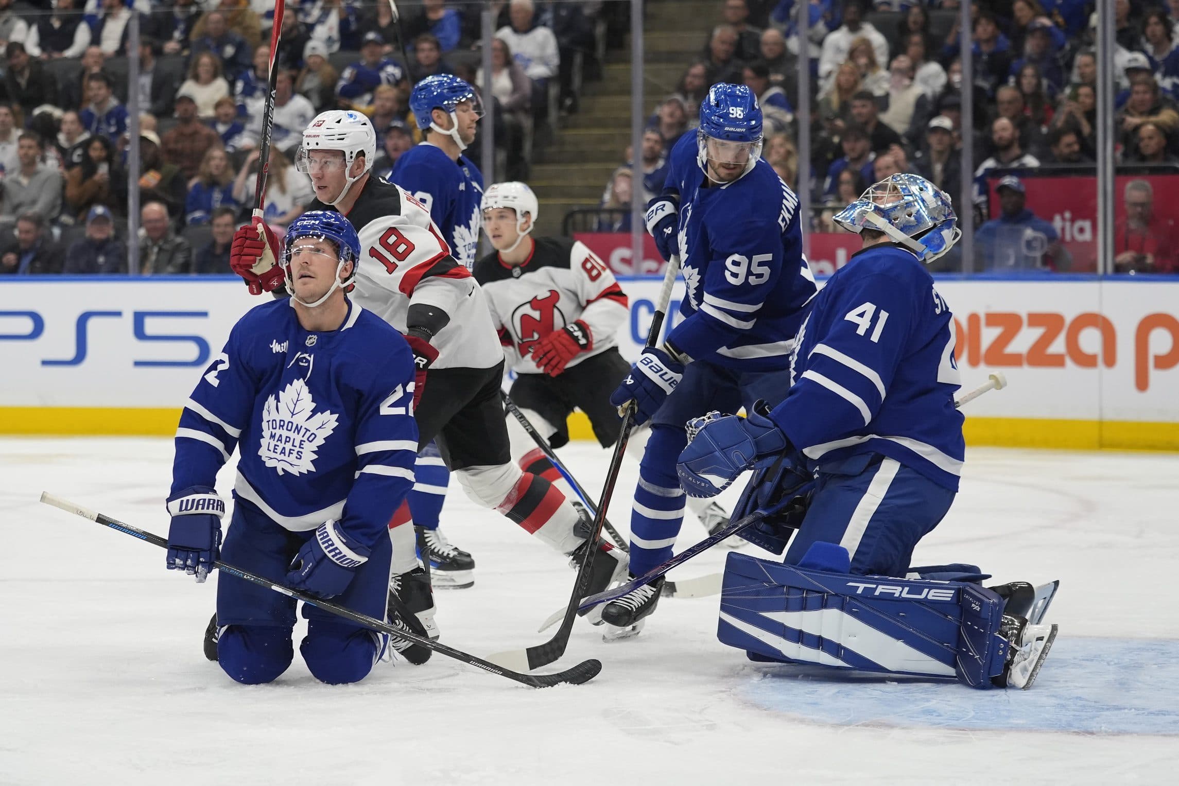 Toronto Maple Leafs goaltender Anthony Stolarz (41) and defenseman Jake McCabe (22) react after a goal by New Jersey Devils forward Cody Glass (not pictured) during the second period at Scotiabank Arena.