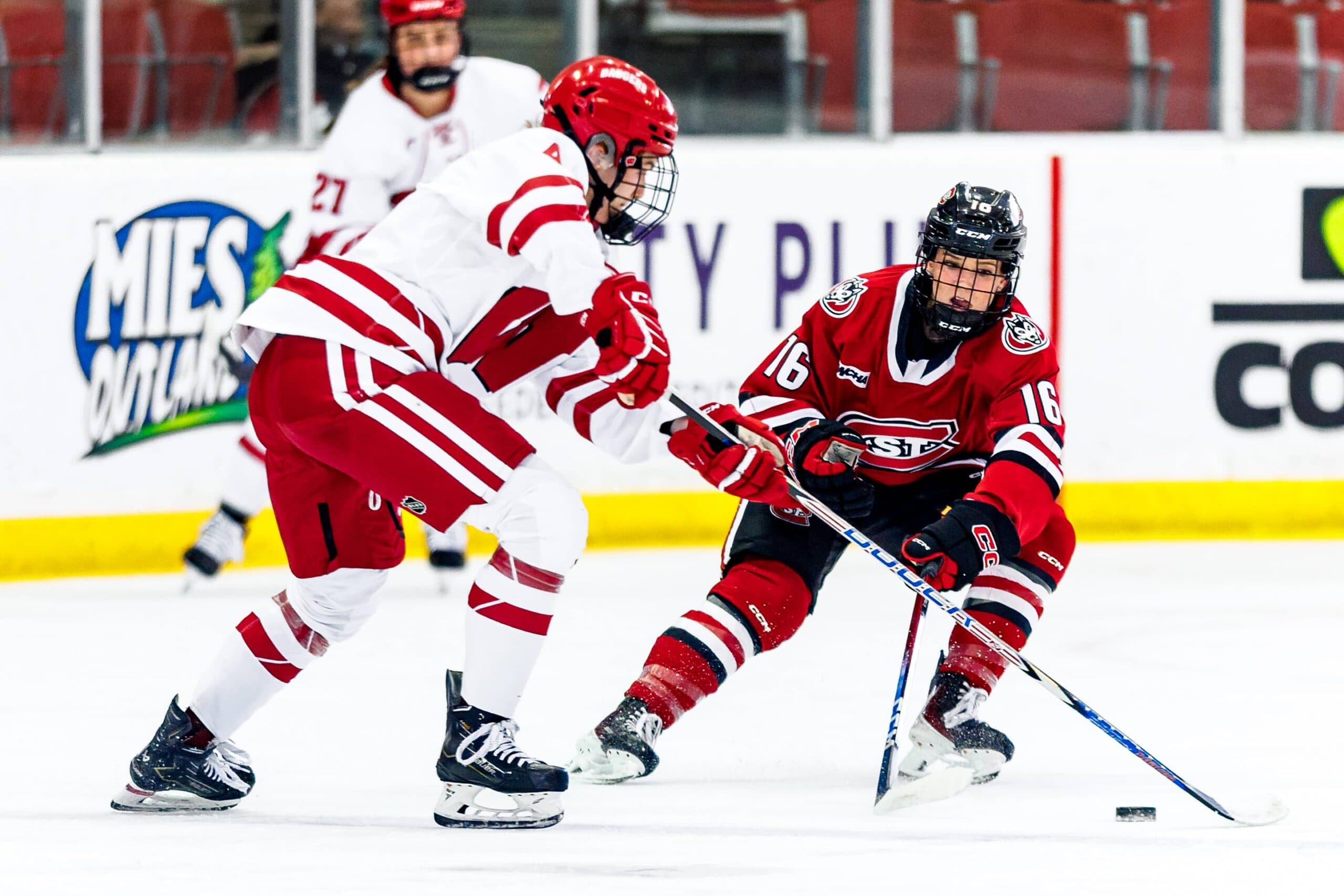 Wisconsin Badgers defender Caroline Harvey, St. Cloud State Huskies forward Avery Farrell