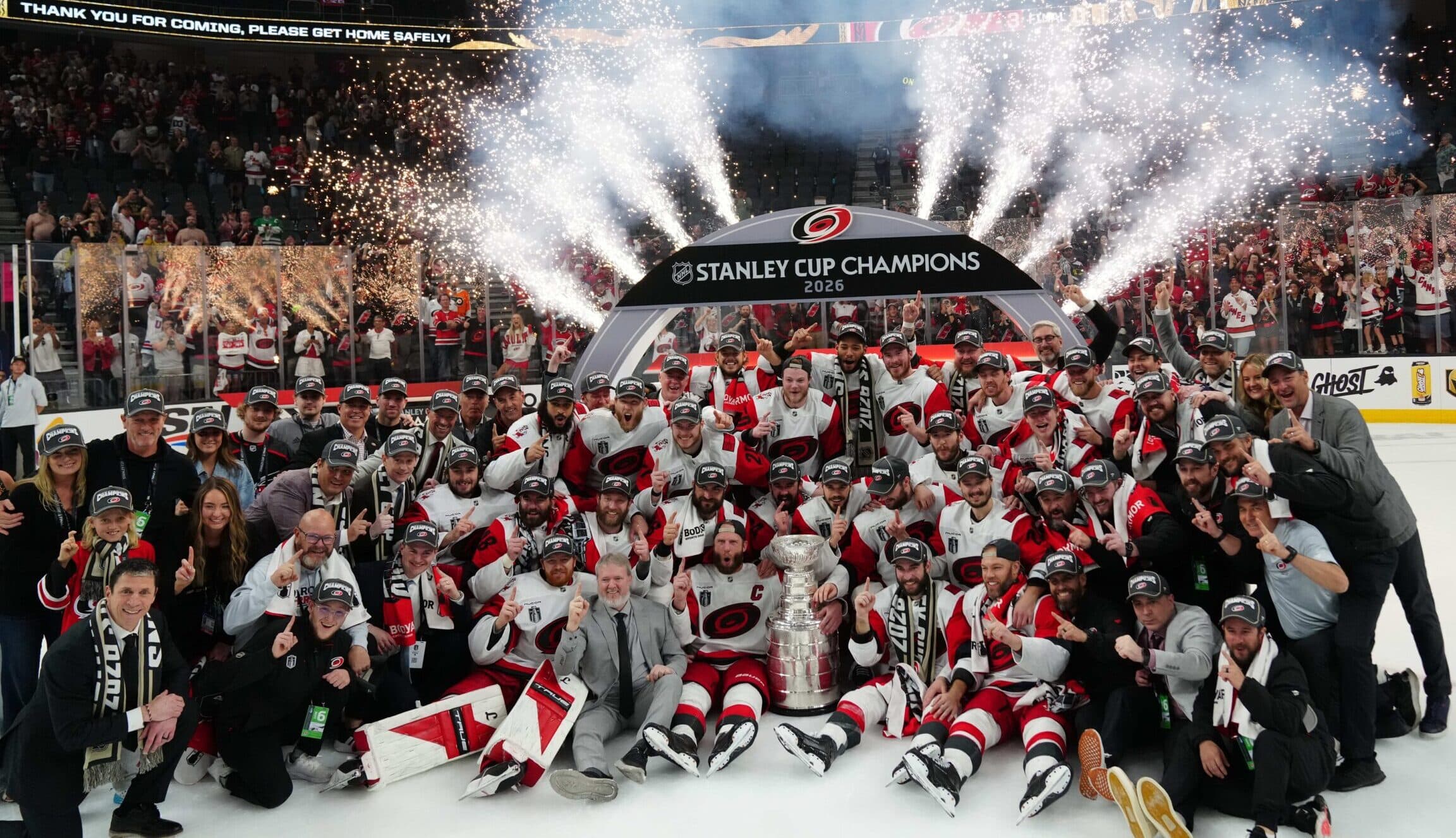 The Carolina Hurricanes pose with the the Stanley Cup after defeating Vegas Golden Knights in game six of the 2026 Stanley Cup Final at T-Mobile Arena.